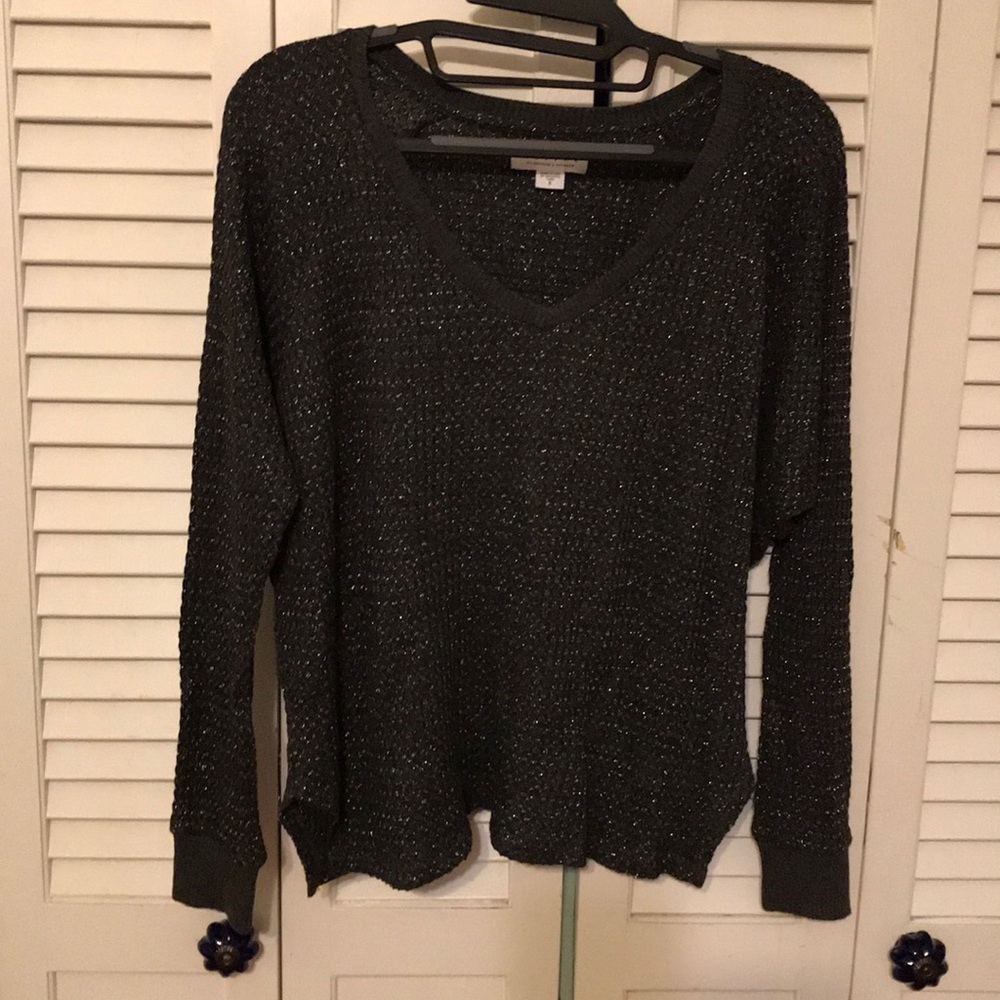 Soft and sparkly long sleeve woven v-neck top
